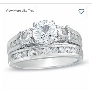 Lab created white sapphire silver ring. Has never been worn.